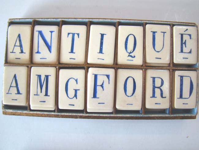 A Boxed Set of Antique Ivory Alphabet Tiles made in France circa 1850-1875 — image 2